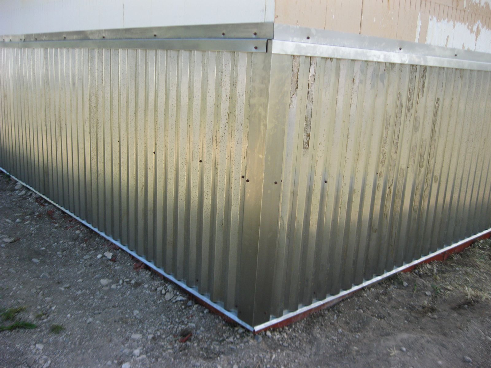 Exterior rusty metal wainscot application