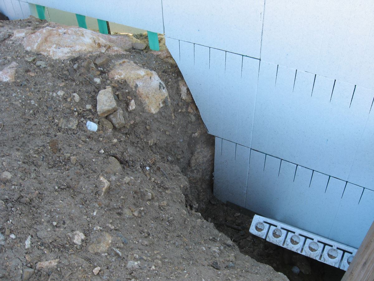 Quad-Lock ICF Home Built on the Rocks - how to build over rocks - Energywise Sustainable Products CO