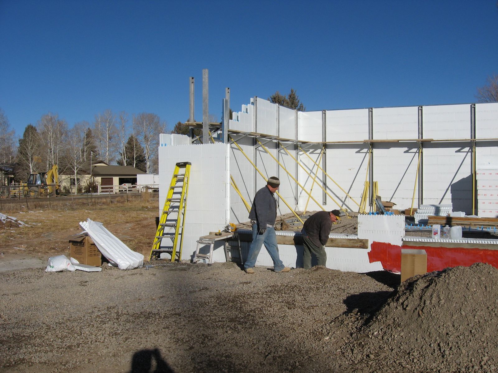 Stacking Quad-Lock ICF walls and applying waterproofing